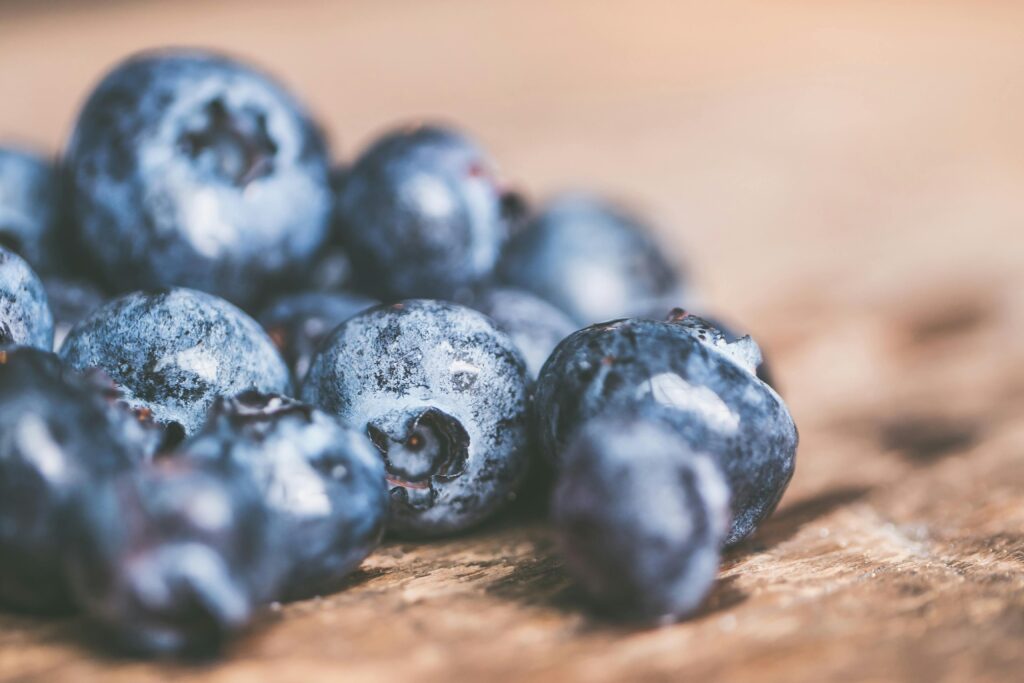 Selective Focus Photography of Bunch of Blueberries